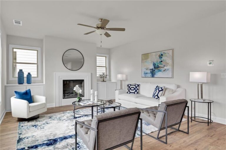 Family room with fireplace in the Parkview Landing model home