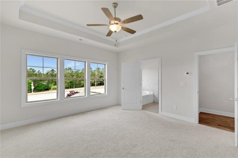 Owner’s suite with tray ceiling in a Parkview Landing home by Three Rivers Homes