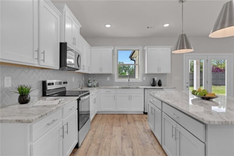 Kitchen with stainless appliances in the Parkview Landing model home
