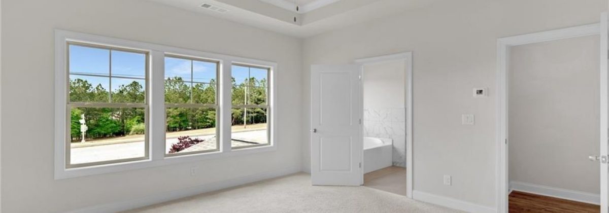 Owner’s suite with tray ceiling in a Parkview Landing home by Three Rivers Homes