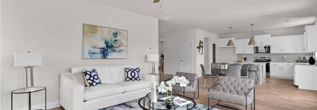 Open-concept family room and living area in a Parkview Landing model home, Buford, GA