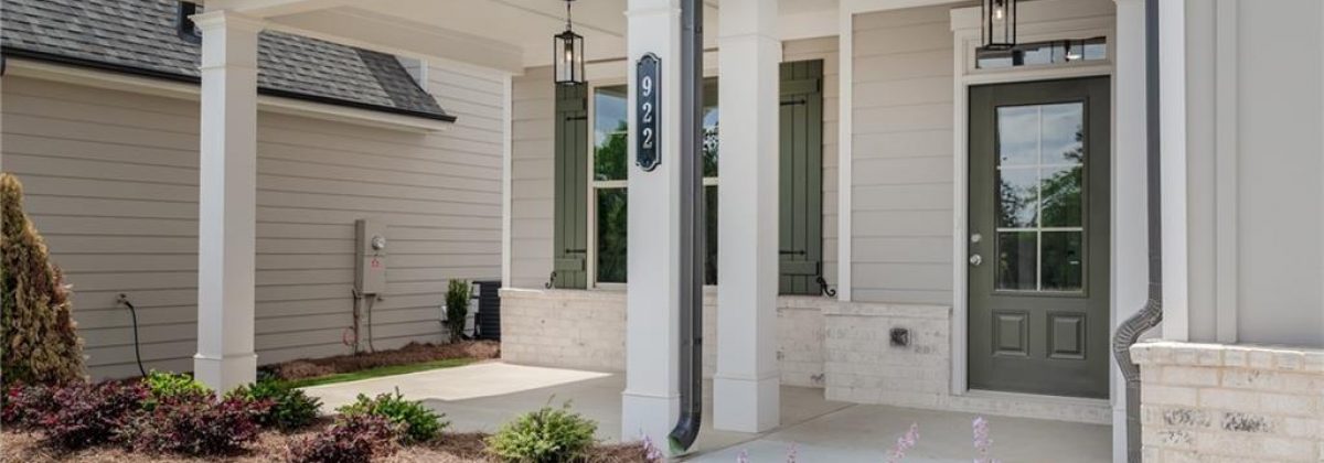Covered front porch and landscaping at a Parkview Landing home in Buford, GA